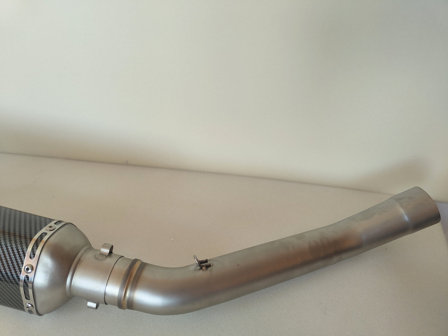 Adjustable sound muffler with dB killer designed for Kawasaki Z750 2004–2012 motorcycle. Stainless steel, durable and lightweight exhaust system for Kawasaki