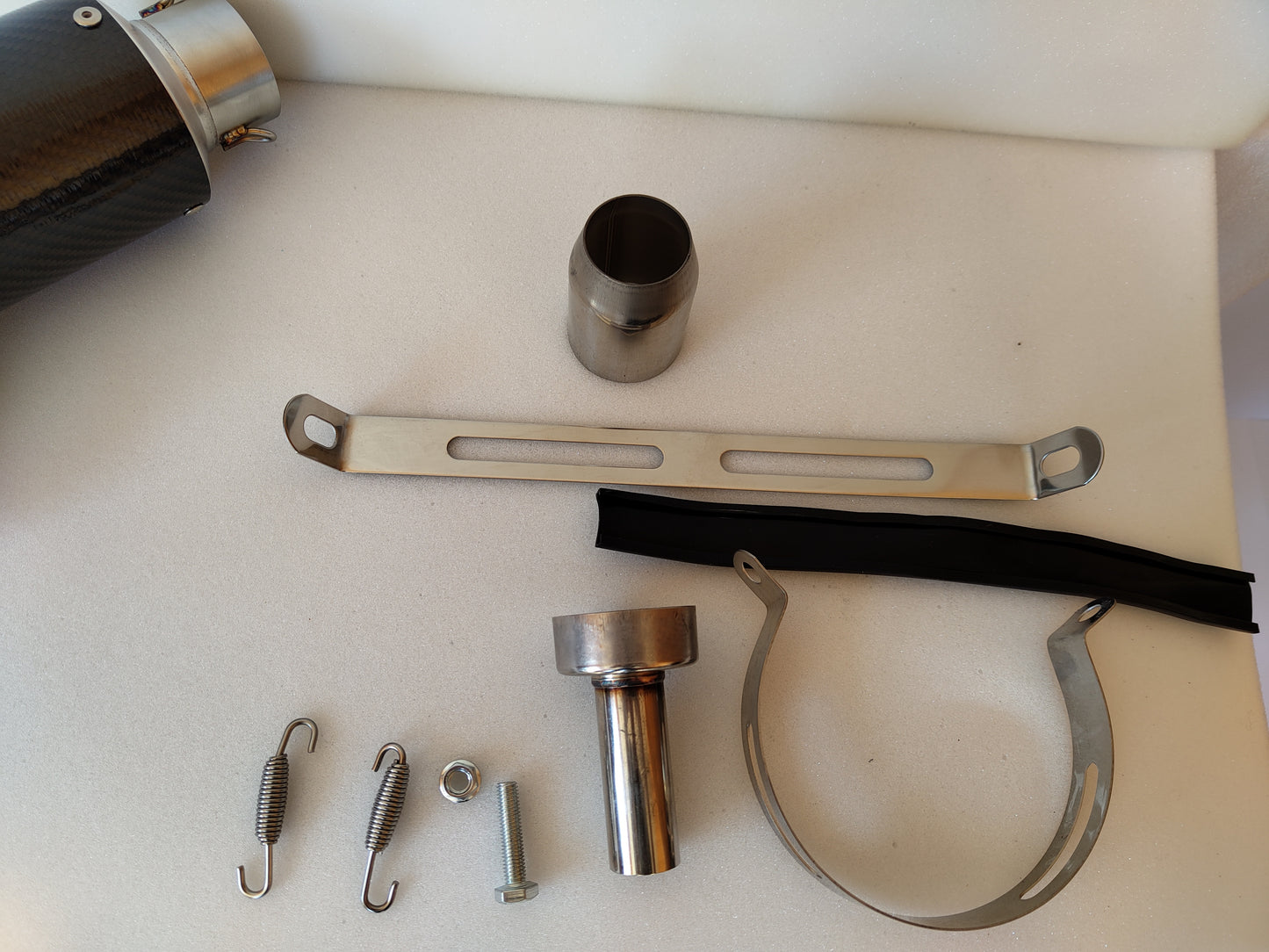 slip-on exhaust with integrated db killer for adjustable sound level.